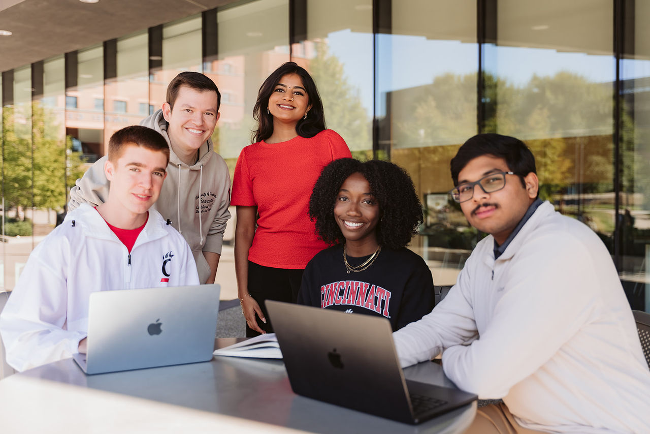 University of Cincinnati students meet outside the Lindner College of Business