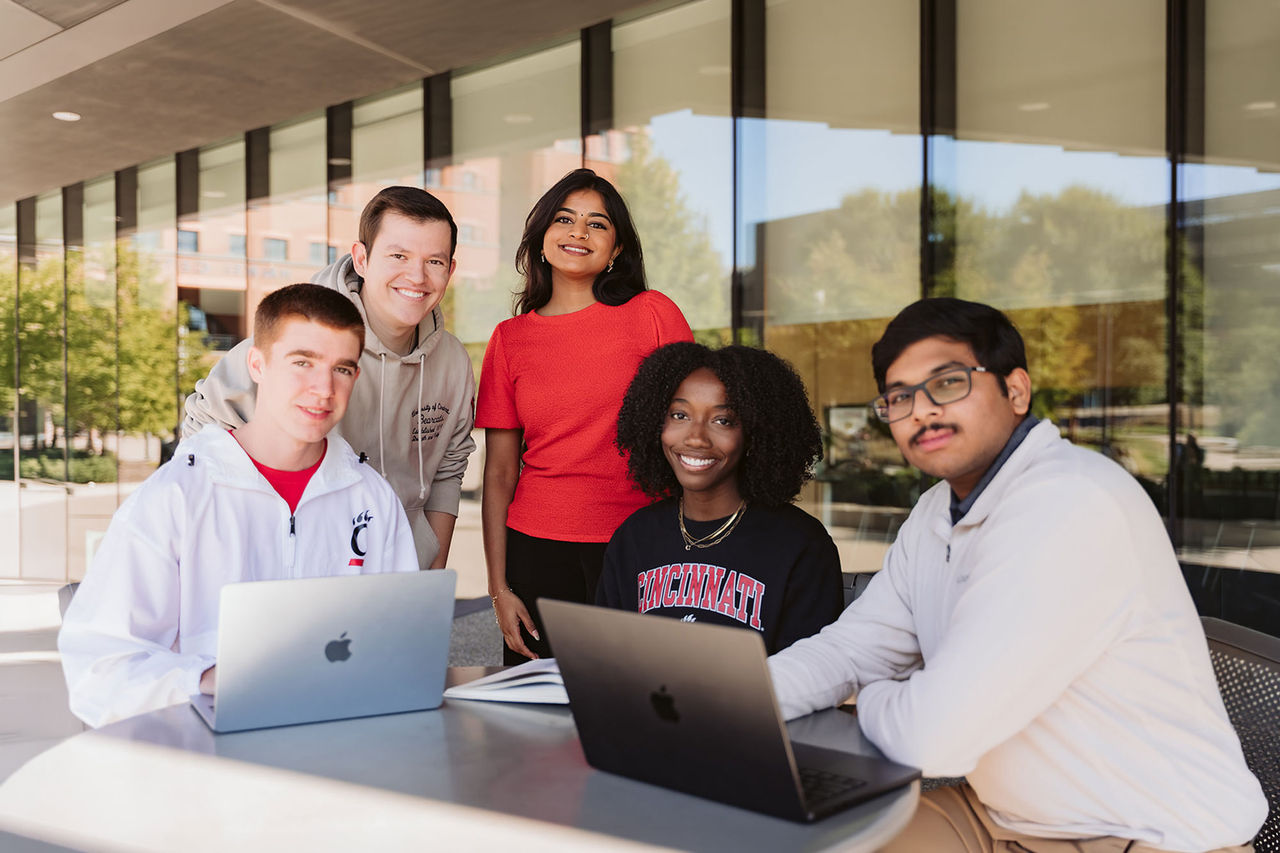 University of Cincinnati students meet outside the Lindner College of Business
