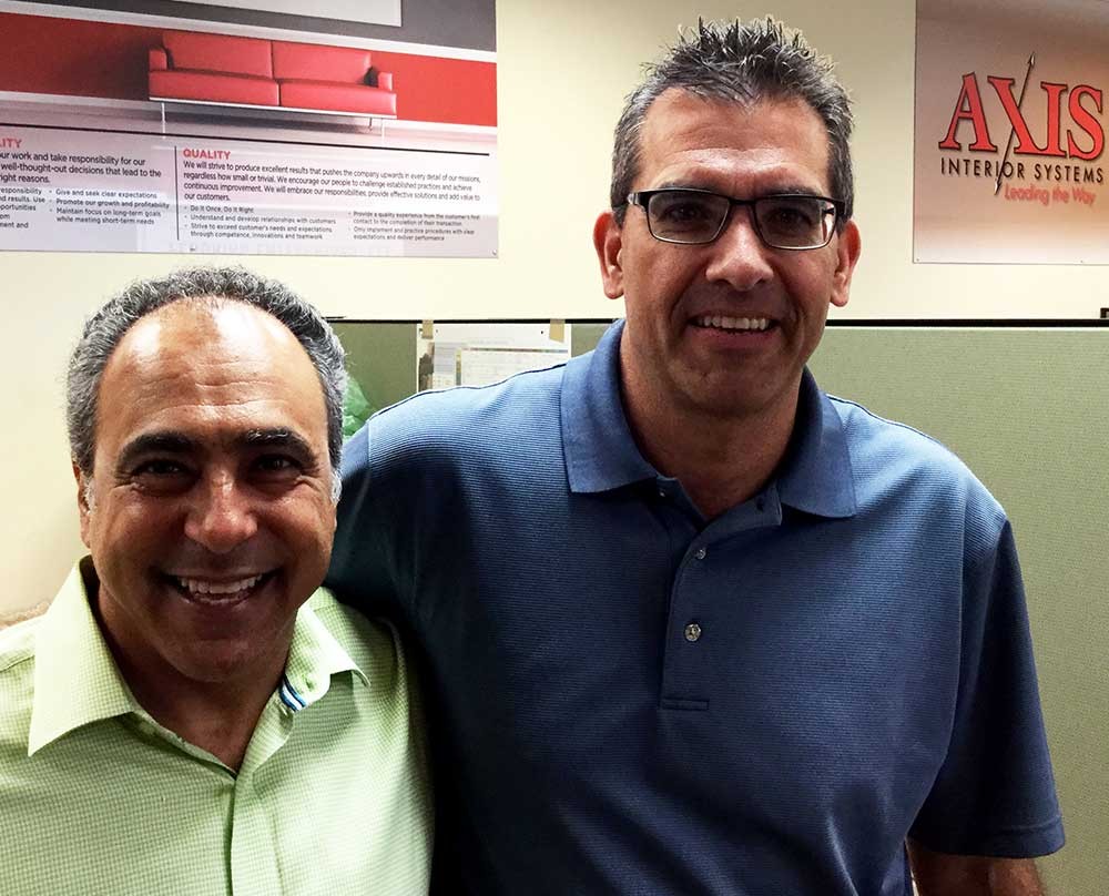 Michael (left) and Phil of Axis Interior Systems, standing in an office