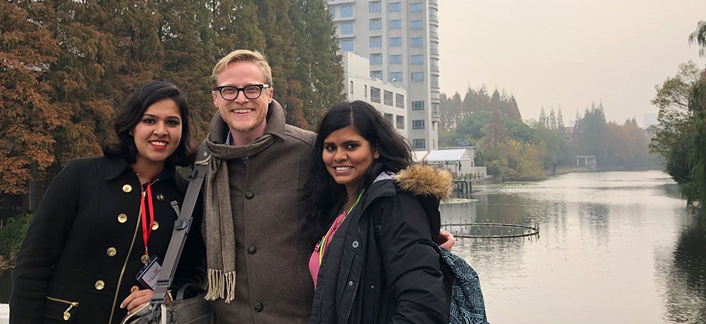 Paul Staudigel with classmates Swetha Parasurama Moorthy (left) and Synthia Srinivasan (right) on the campus of East China Normal University in Shanghai, China. 