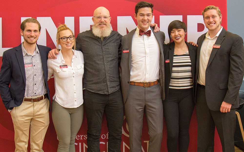 Left to right: MBA students Joey Kappen and Abby Burdon, Rhinegeist Director of Culture Dennis Kramer-Wine, and MBA students Jonathan Lee, Bianca Catibog and Jon Vincent.
