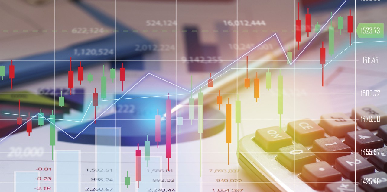 stock photo of calculator and graphs