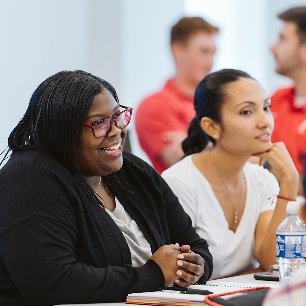 two female students in a classroom