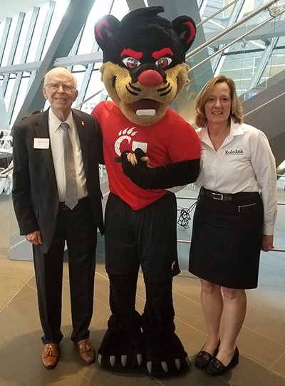 Marvin P. Kolodzik with Ruth Seiple and the Bearcat mascot